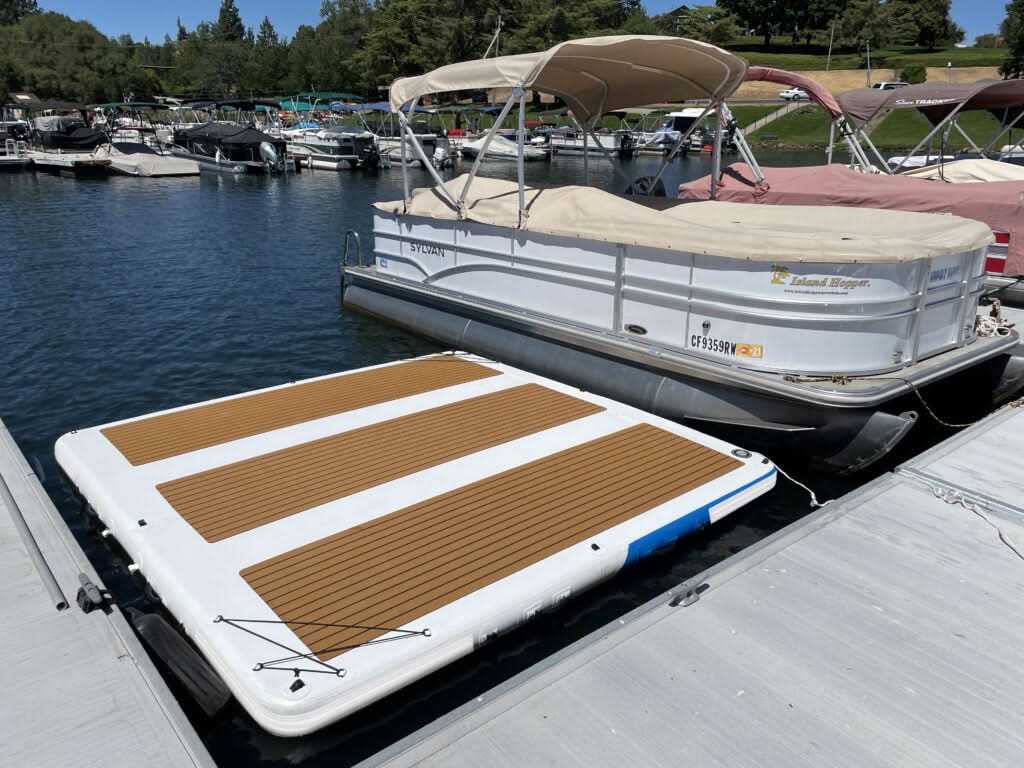 Island Hopper Mega Yacht Dock 10 x 10 ft inflatable water island platform fills the boat slip