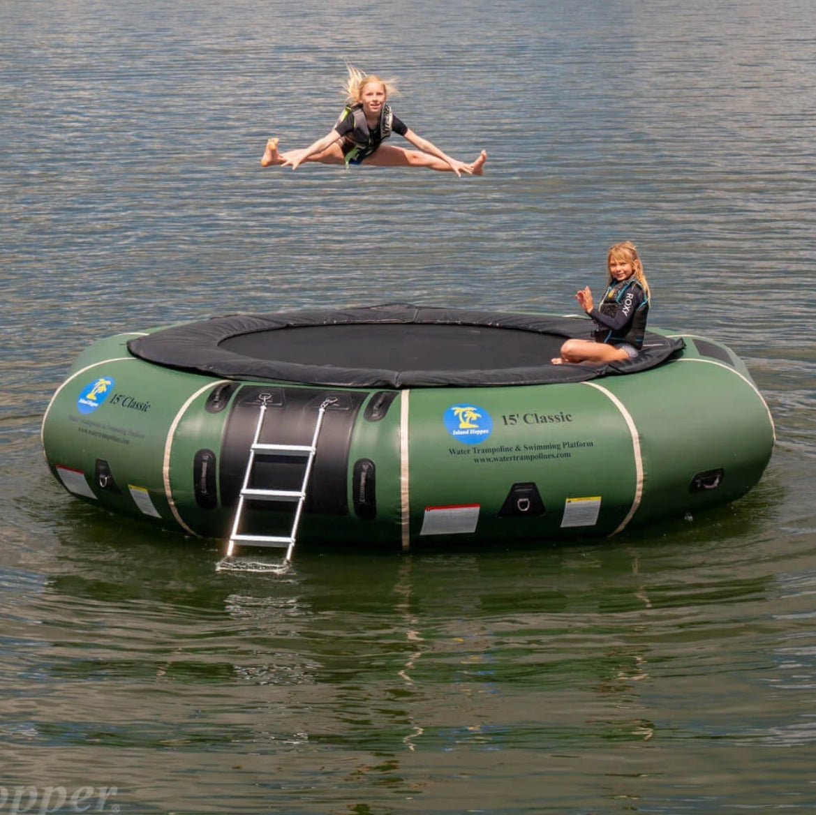Island Hopper 15ft Classic natural green steel frame spring water trampoline floating on a lake