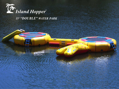 Family jumping on Island Hopper 15ft Classic steel frame water trampoline on the lake in summer