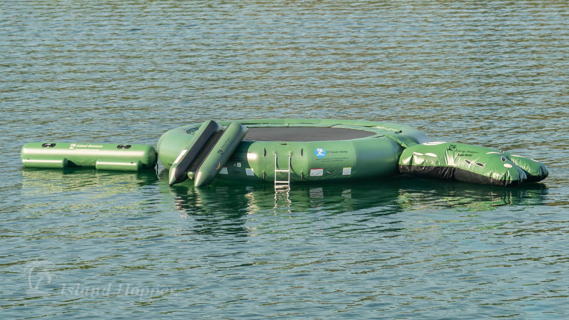 Island Hopper 25ft Giant Jump natural green floating lake trampoline with two boarding areas anchored in open water water park green