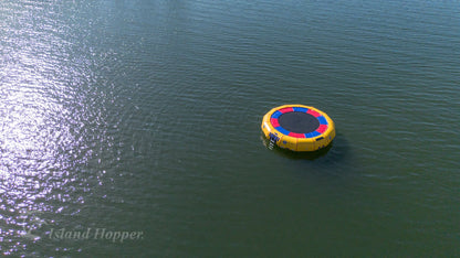 Island Hopper 20ft Acrobat floating lake trampoline with steel frame anchored in open water