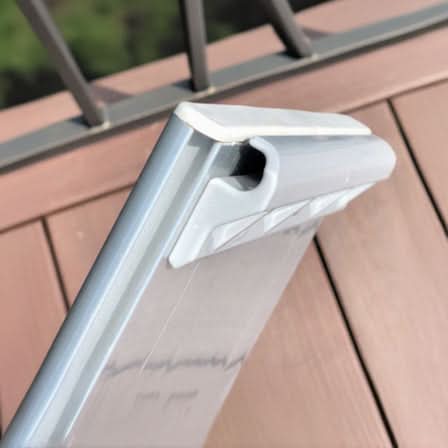 Slide-on mount of an aluminum bench seat on a PVC seat rail