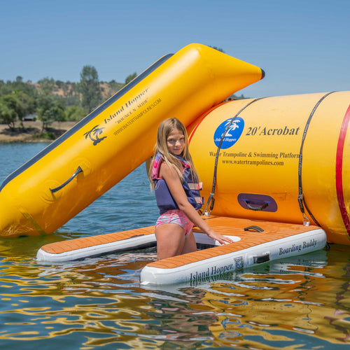 Boarding Buddy inflatable dock attached to Island Hopper water trampoline boarding ladder