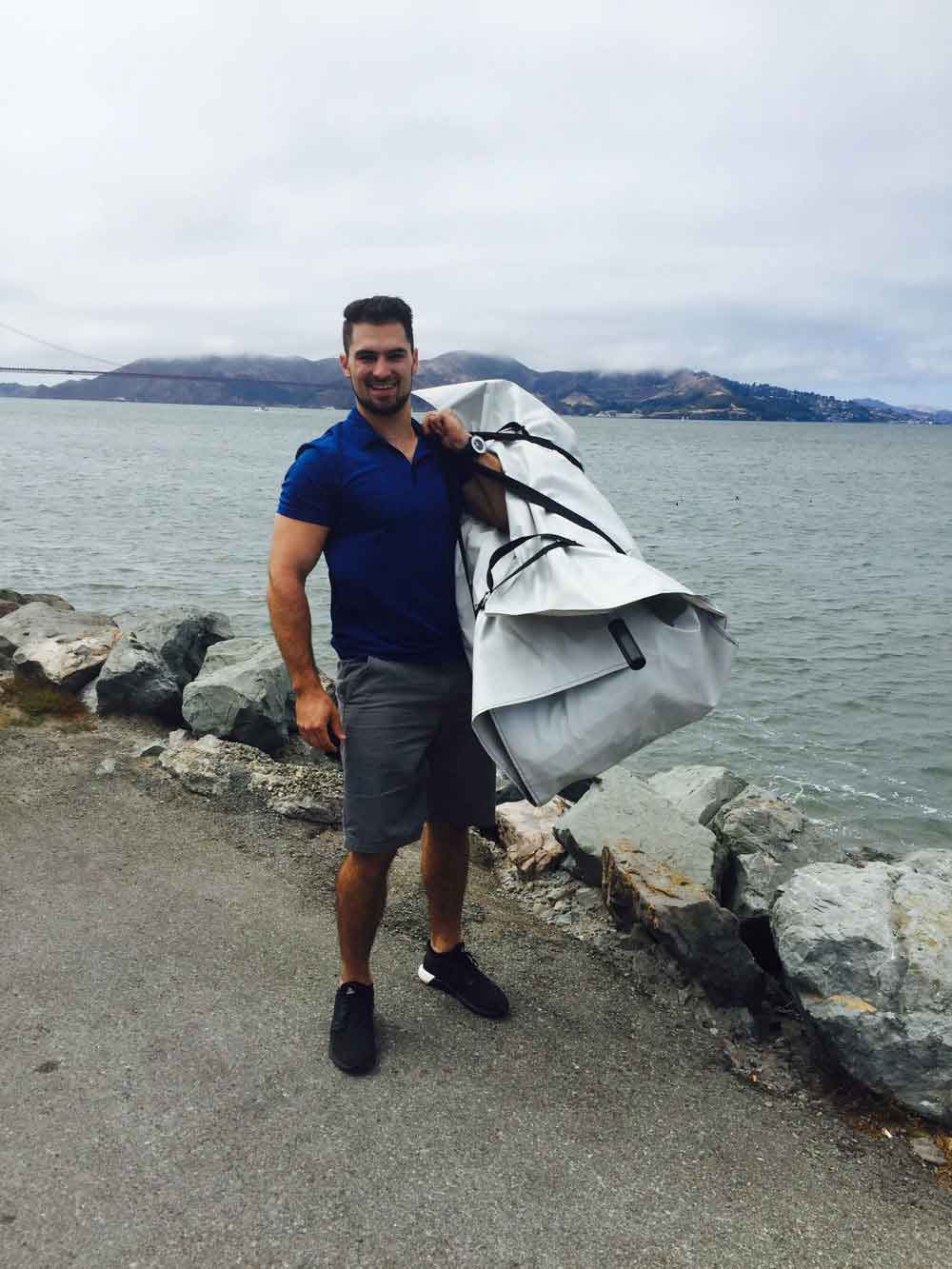 Carry handles and hanging strap on a heavy duty inflatable boat bag