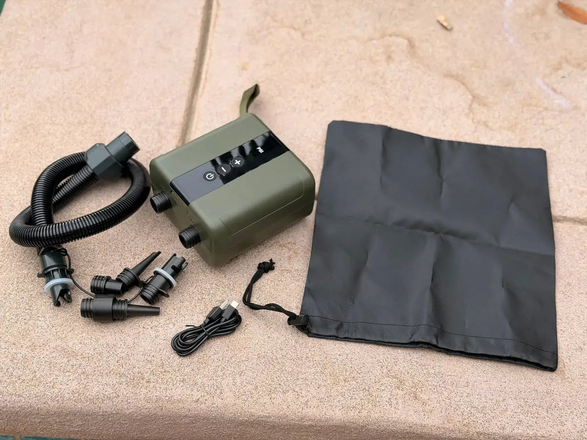 Wireless air pump kit with hose, valve adapters, USB-C charging cable, and storage bag